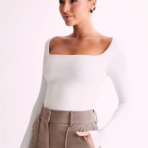 BRIDGET
Recycled Nylon Long Sleeve Top - White